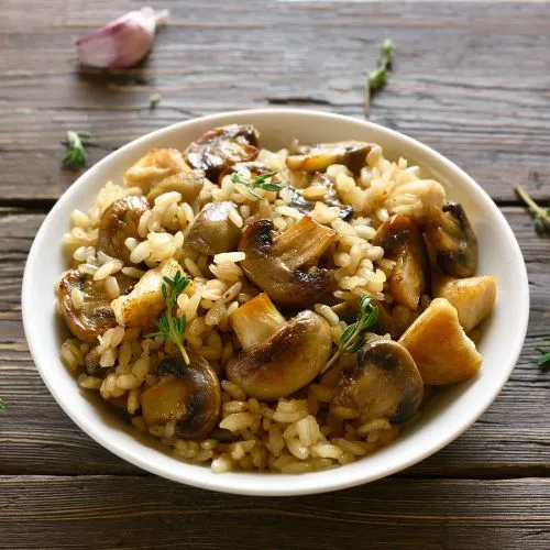 Gebratener Butterreis mit Champignons Gebratener Butterreis mit Champignons